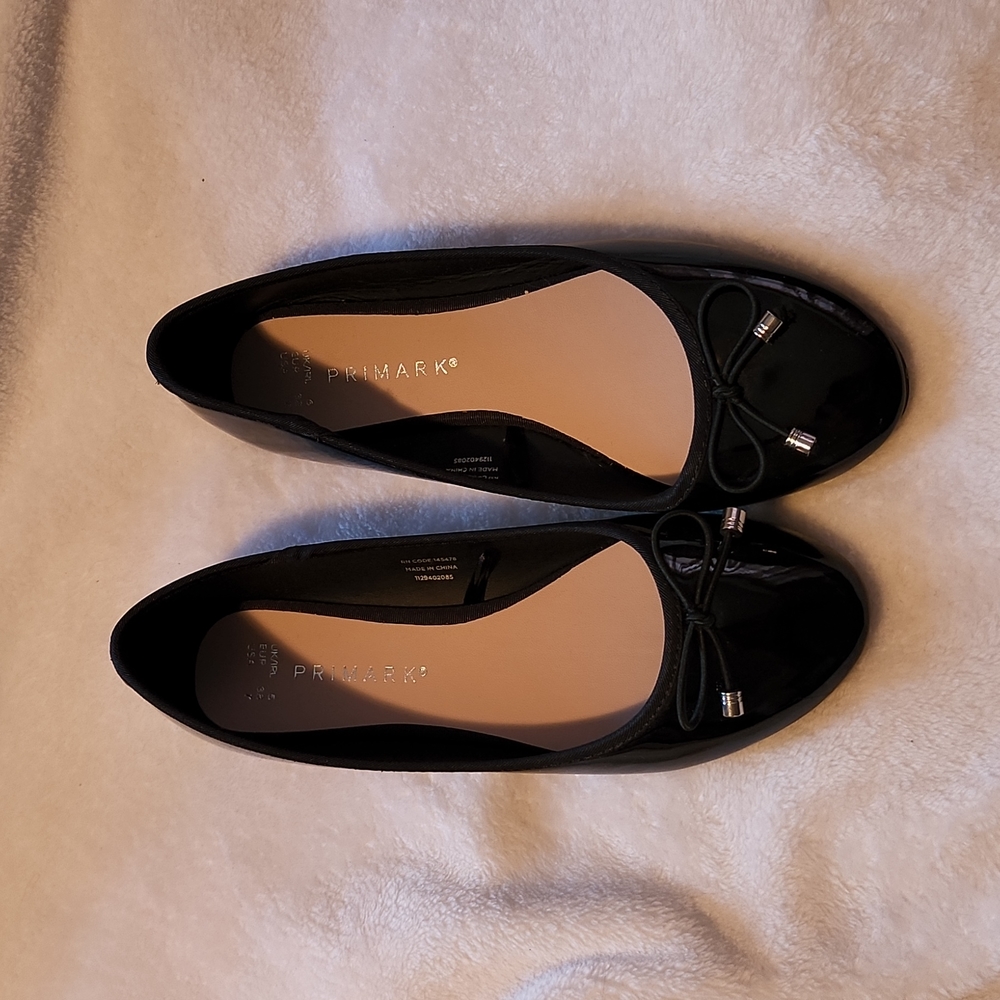 Black patent leather ballet flats
